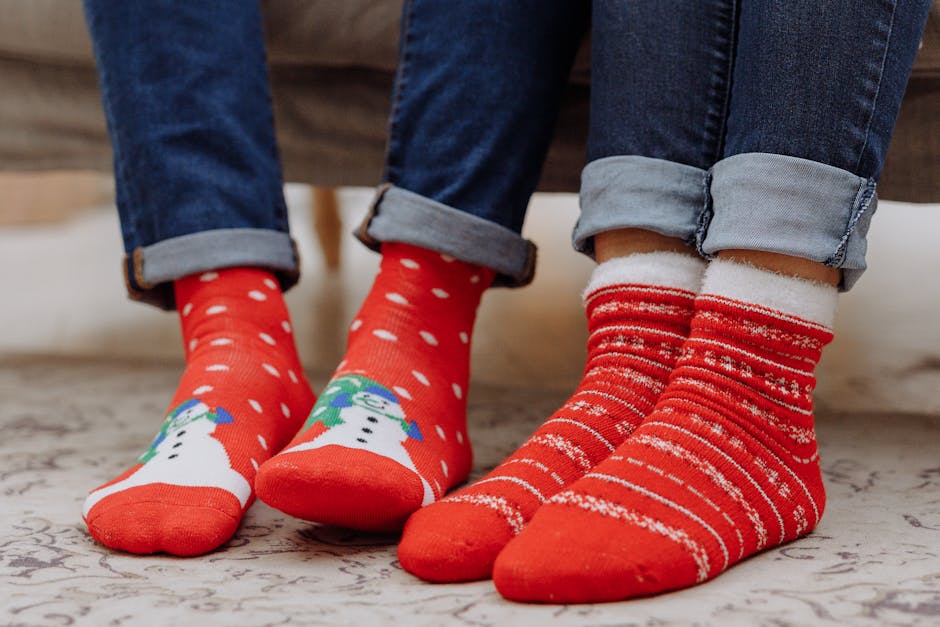 Close-up of cozy Christmas socks on a carpet, perfect for winter warmth.